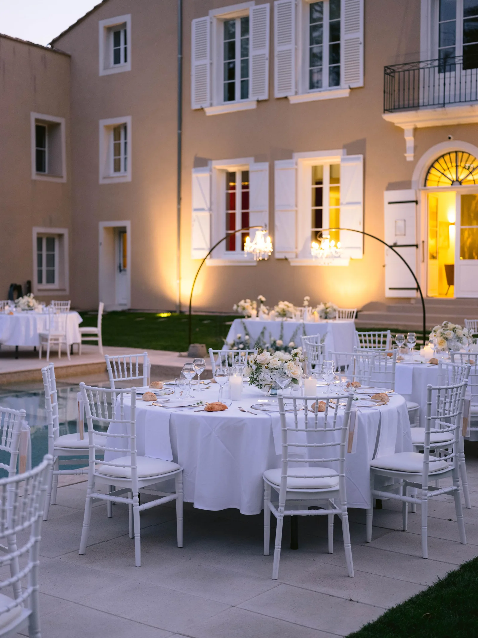 Round table set at dusk — Wedding reception