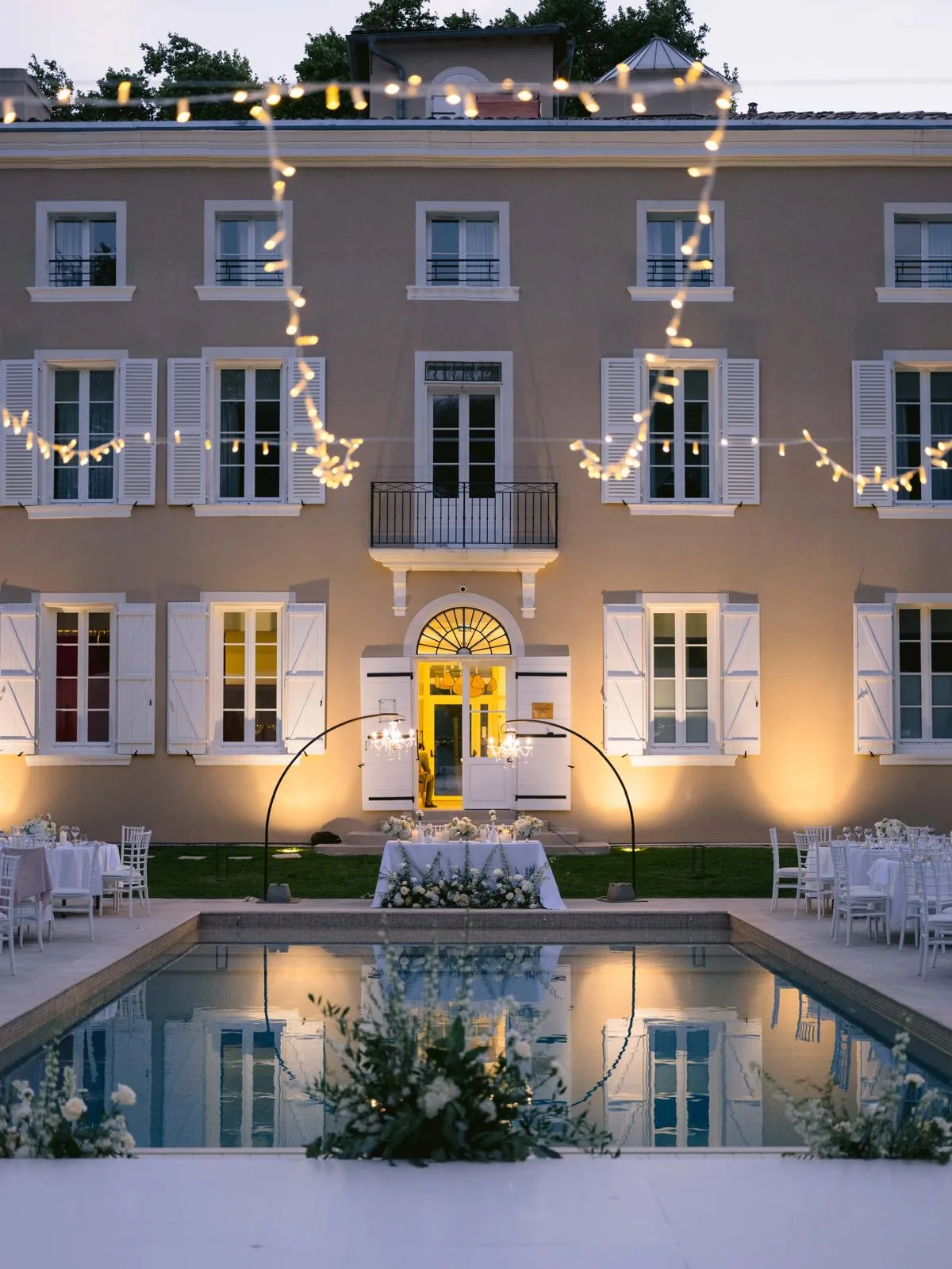 Provençal château at dusk — wedding reception